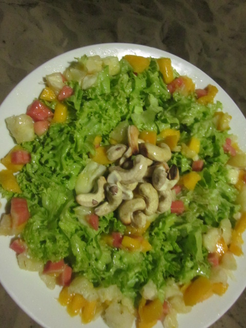 Tropical fruit salad with all local produce - fresh tropical fruits and cashews